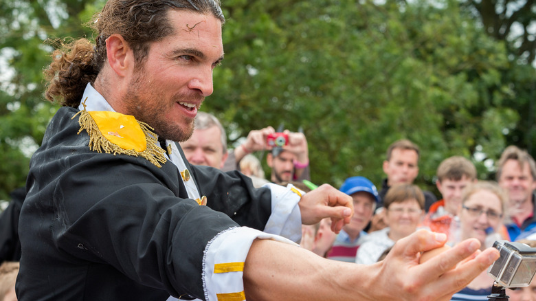 A man gets ready to throw an egg at the World Egg Throwing Championship