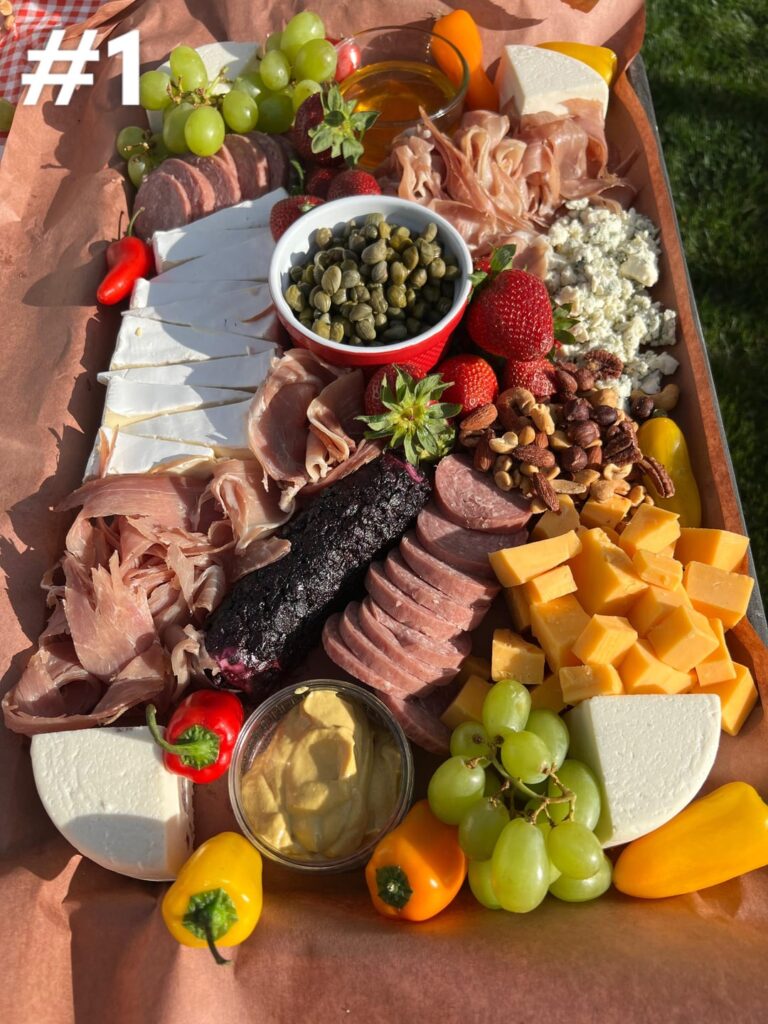 Wedding catering coming up: which of these two boards we did previously look better? Trying to decide.