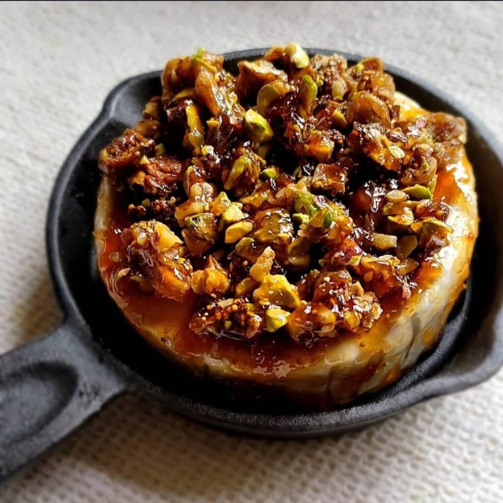 Homemade: Baked Brie with mixture of fig jam, pistachios nuts and walnut