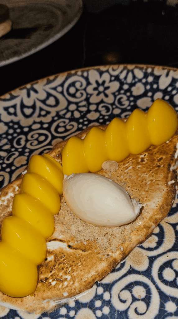 Lemon Tart over a toasted Meringue.