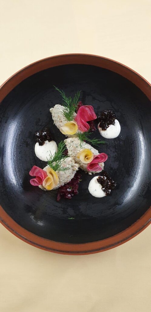 Smoked trout tartare with beetroot, horseradish, cucumber & sour cream.