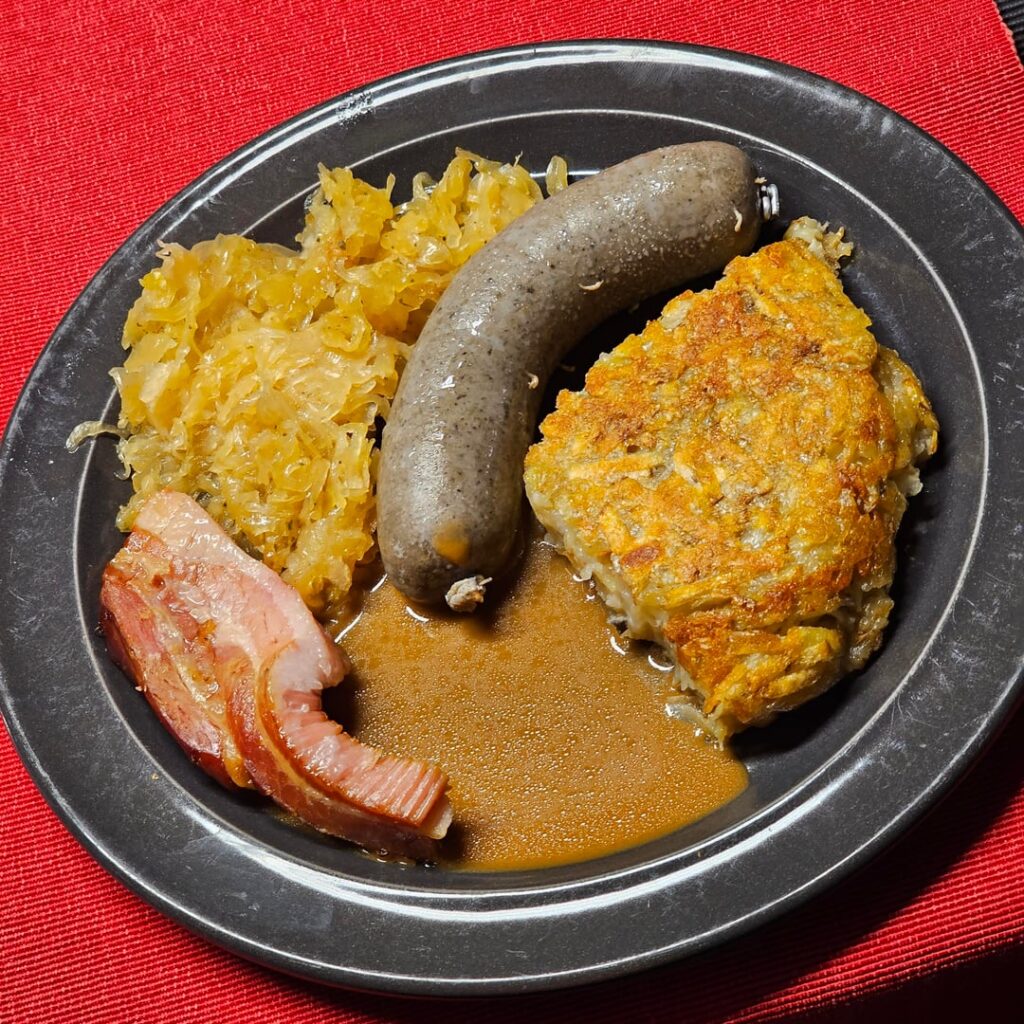 Veal liver sausage with rösti and sauerkraut