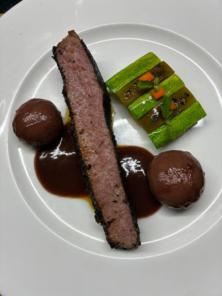Sirloin, red wine soaked mushrooms, red wine glaze, cucumber-eggplant on truffle purée