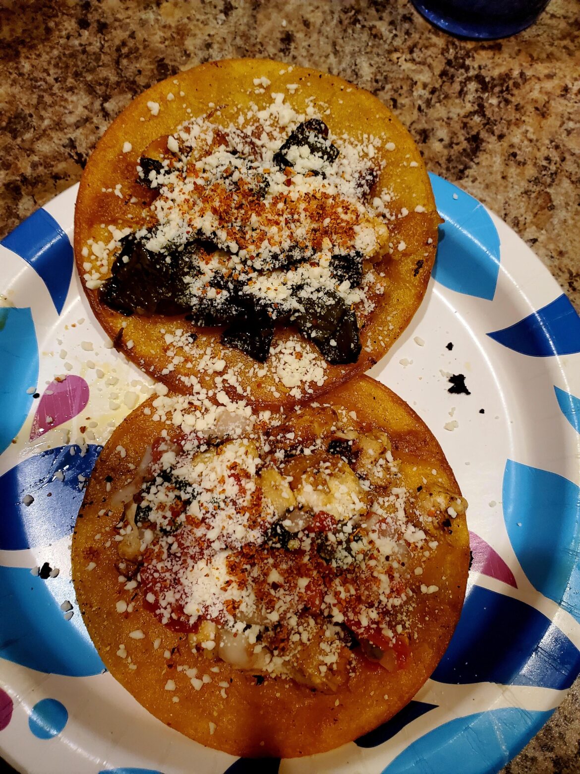 Chicken Tacos- One topped with Pico and the other topped with roasted poblanos. Both topped with Cotija and Tajin.