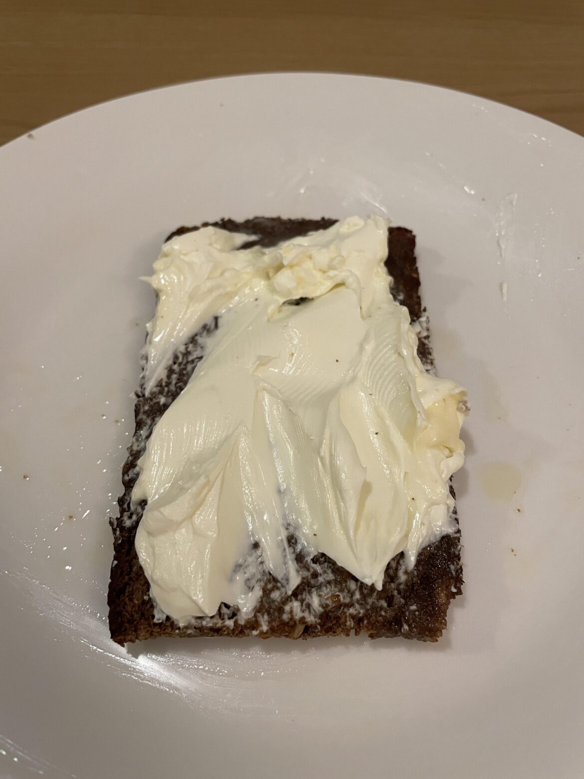 Butter and Philadelphia on toasted rye bread