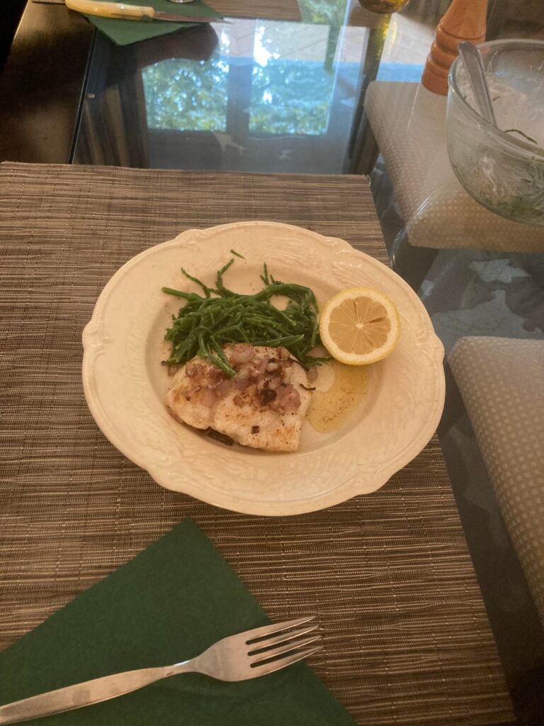 Monkfish cheeks and salicorns with shallot butter sauce