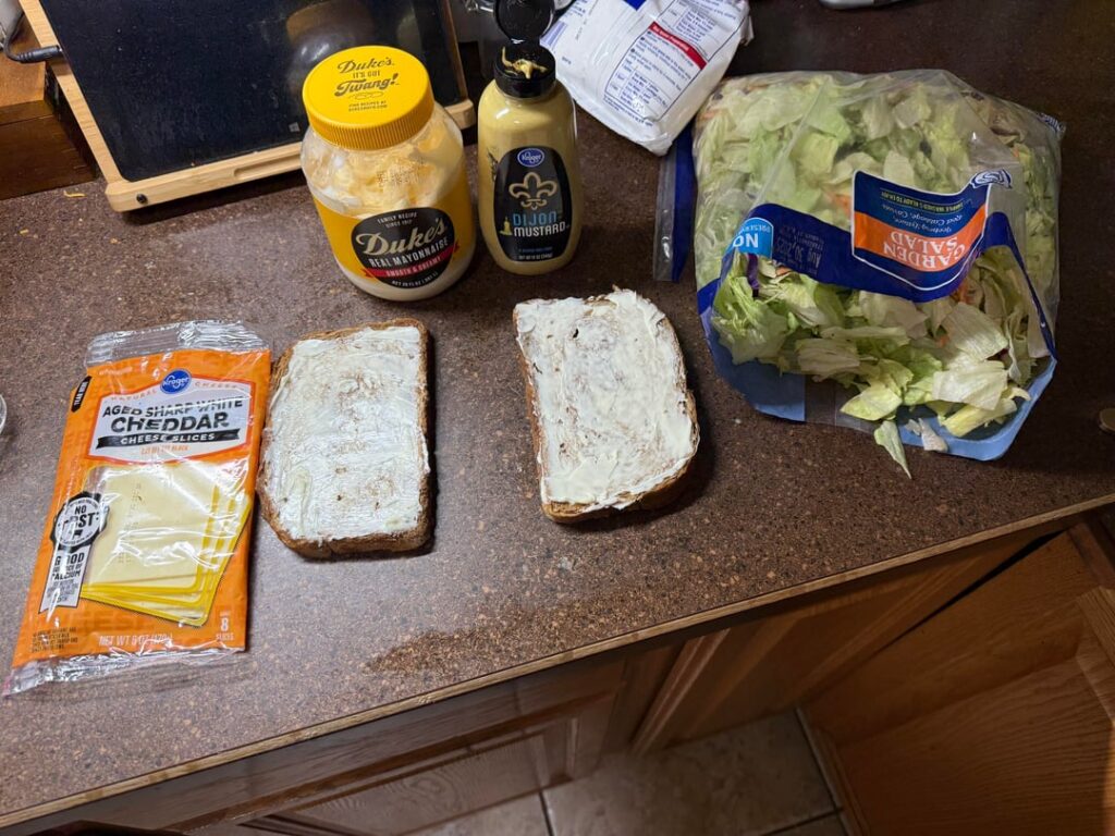 Ham and turkey with white cheddar on rye Ham and turkey with white cheddar on rye