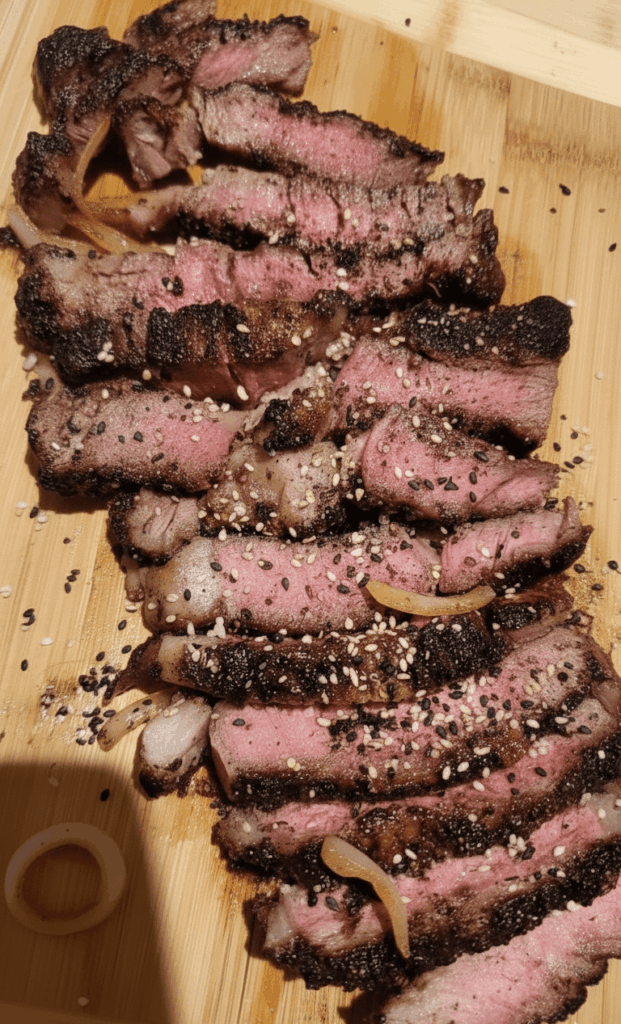 Reverse-seared ribeye + roasted sesame seed and caramelized onions toppings