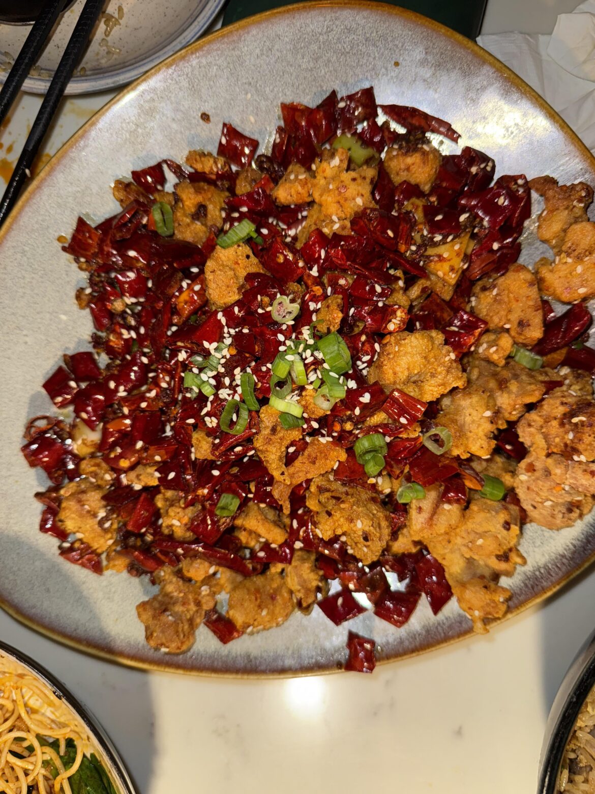 Antidote in NYC is serving dry chili chicken that’ll light you up in the best way