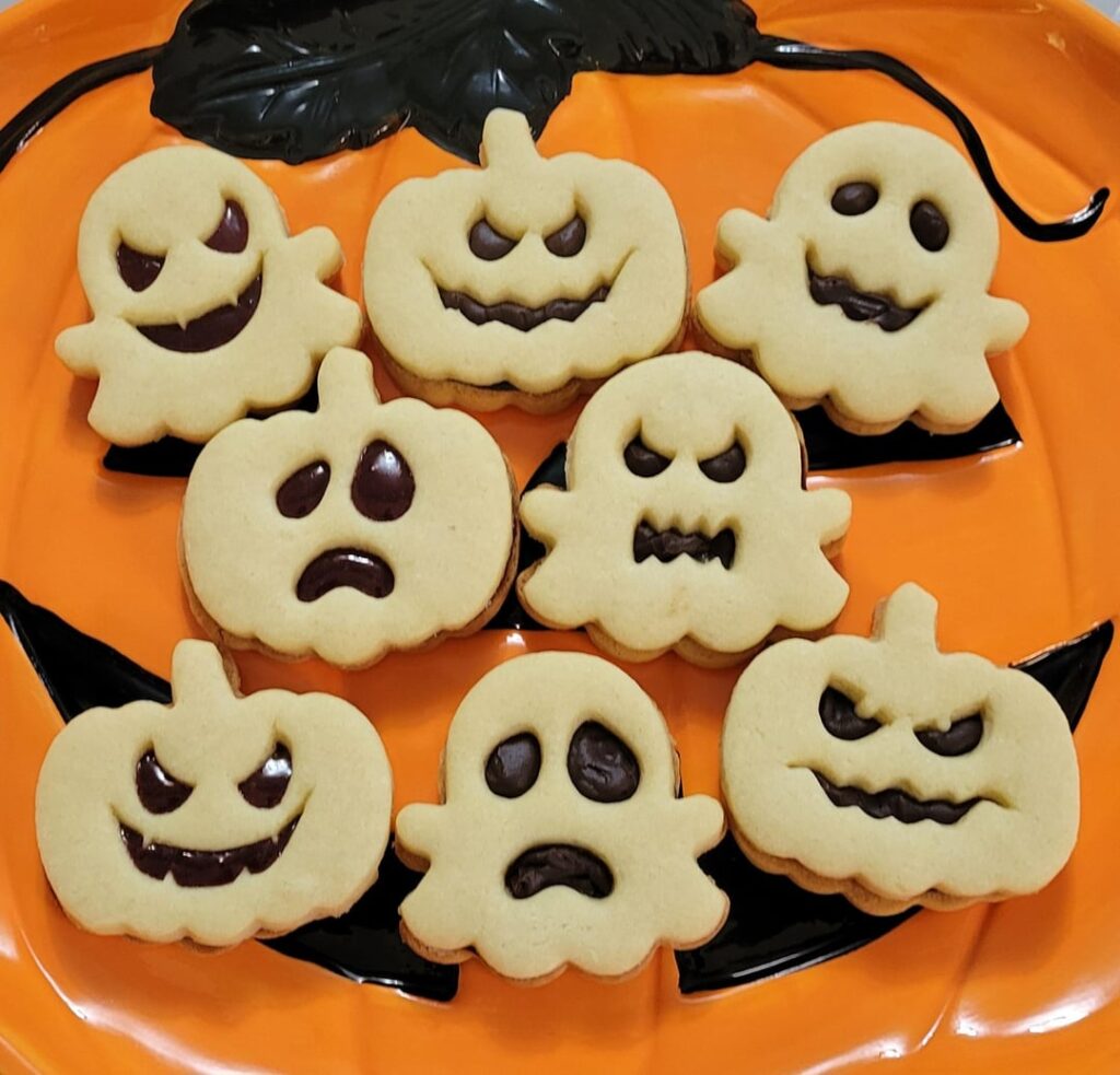 Calling these my Spooky Cookies, ganache and cherry filled sandwich cookies.