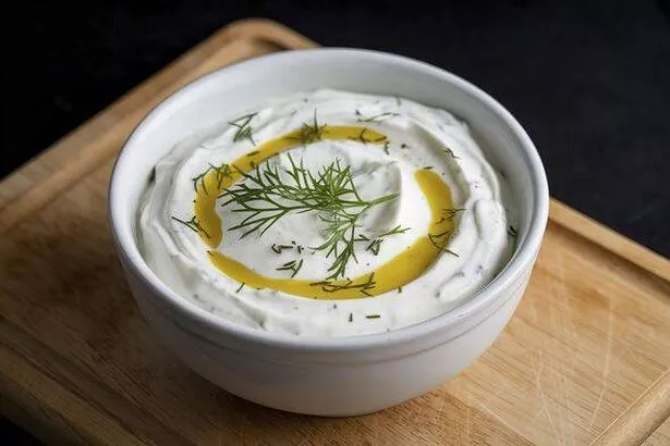 A bowl of Greek dip sauce or dressing tzatziki