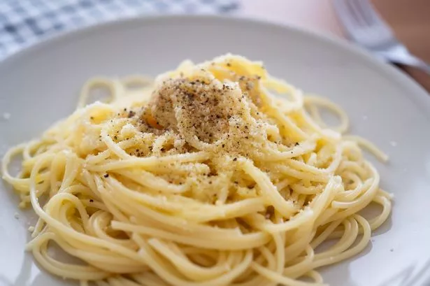 A plate of cacio e pepe pasta