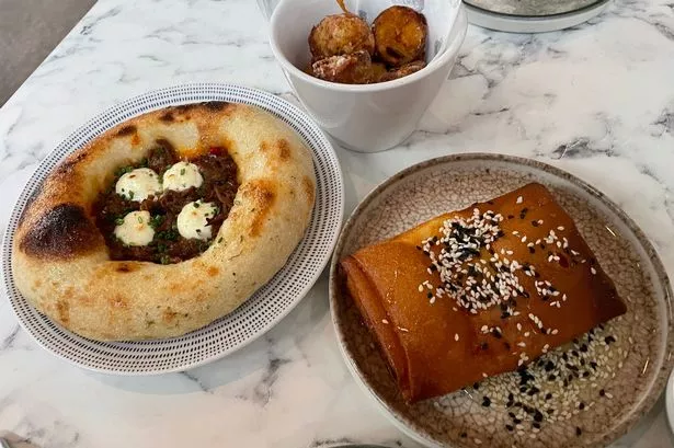 The lamb flatbread and feta wrapped in pastry at Kallos Cafe & Wine Bar, Salford