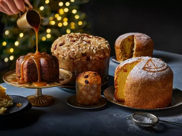 An image of Christmas puddings on a party spread 