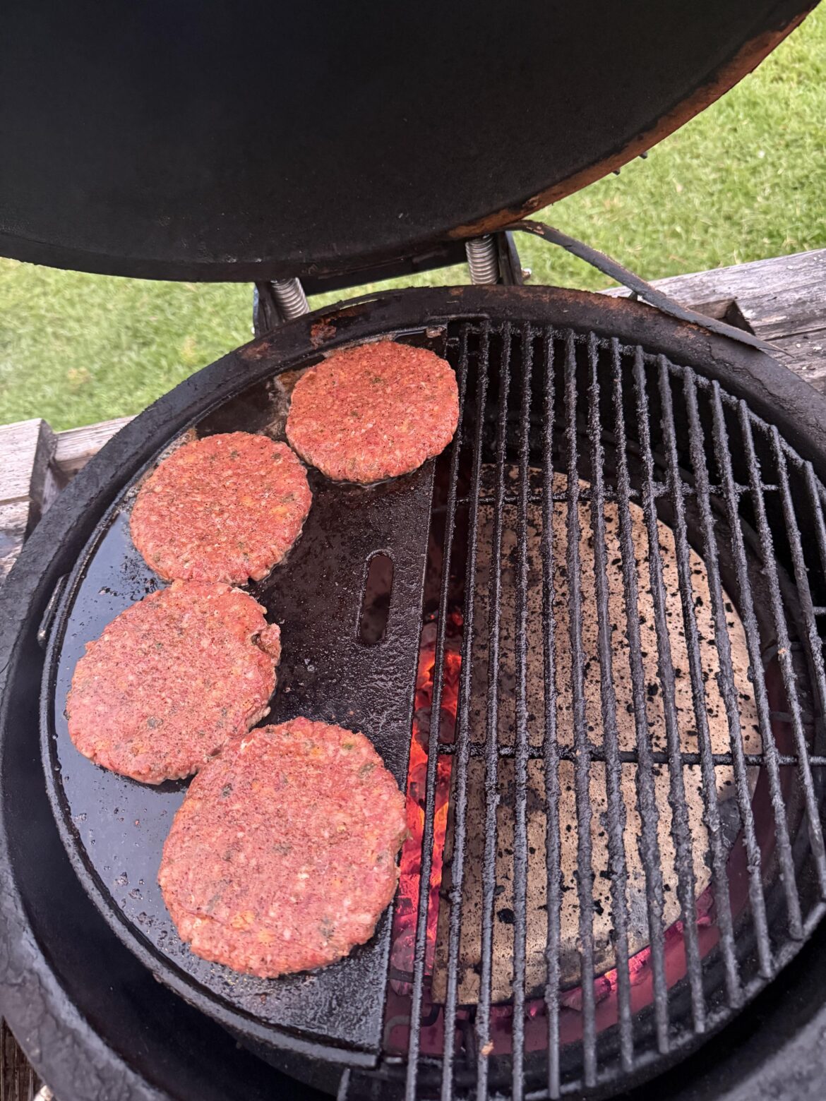 Anybody else do burgers like this? Still get the crispy edges of a smash burger but get the good smoky flavor from the charcoal too