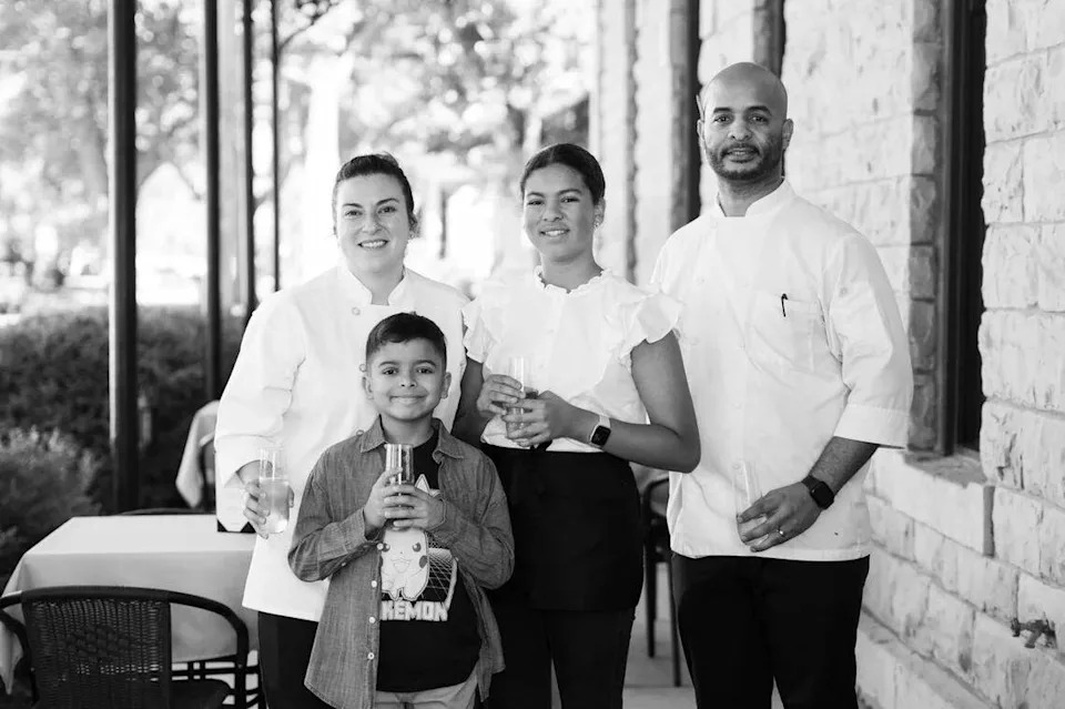 Chef Luis Pena, right, is pictured with his wife, Alicia, left, and his children, Julisa, center, and Zoell, second from left.