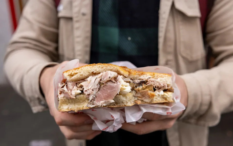 Sandwich from All'Antico Vinaio containing meat and cheese