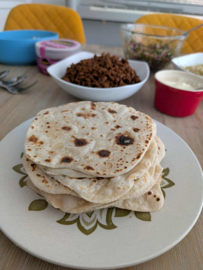 I made my own tortillas this time. But I kept the rice, cheddar and lettuce.