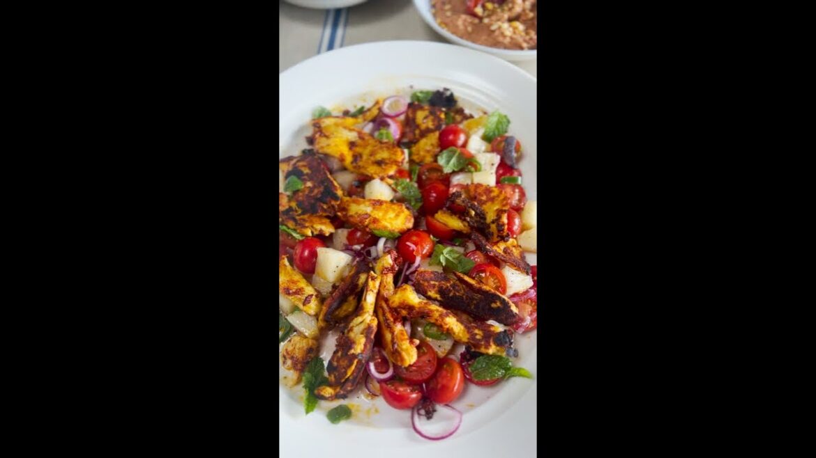 Achiote halloumi on tomato & pineapple salad