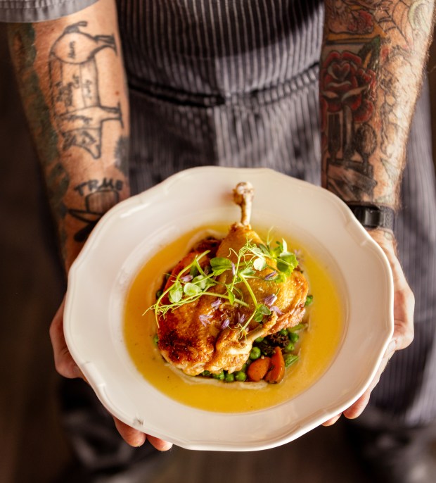 Poutlet Rotia, heritage chicken with spring vegetables, wild mushrooms, whipped garlic, and vin jaune jus from Poppy restaurant Thursday, June 12, 2025 in Glen Ellen. (John Burgess / The Press Democrat)