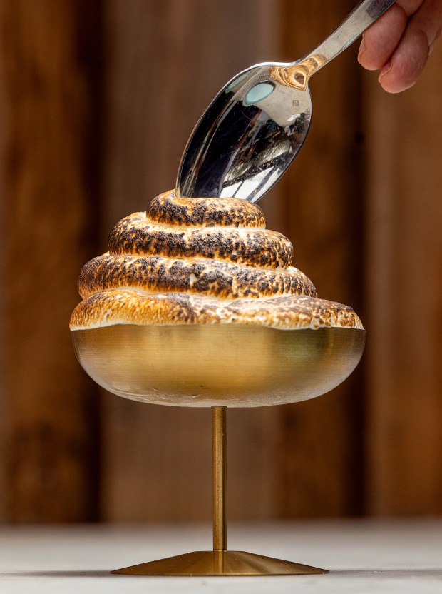 "Baked "Gelaska" with vanilla gelato, raspberry sorbet, sponge cake and cubes of torched marshmallow fluff from Stella Wednesday, March 26, 2025 in Kenwood. (John Burgess / The Press Democrat)