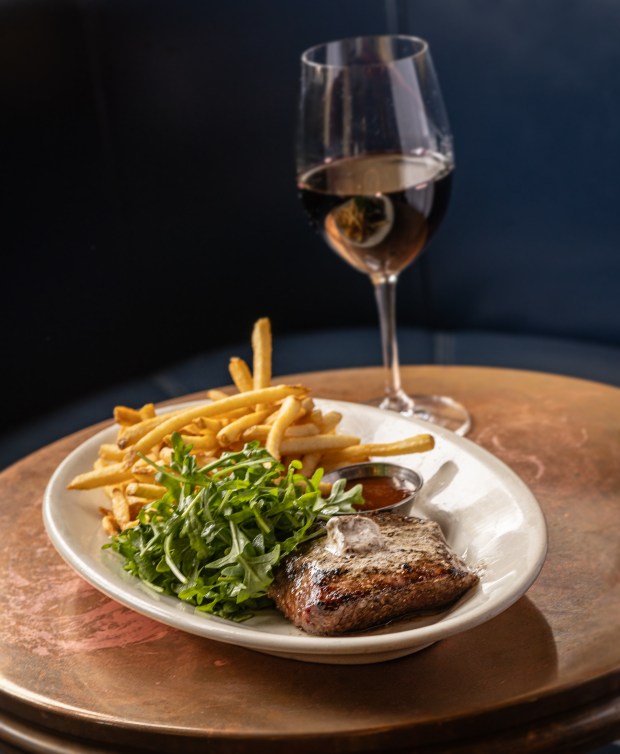 Flat Iron Steak Frites with mushroom-shallot butter, arugula, chipotle steak sauce and frites from Underwood Bar and Bistro Friday March 21, 2025 in Graton. (John Burgess / The Press Democrat)
