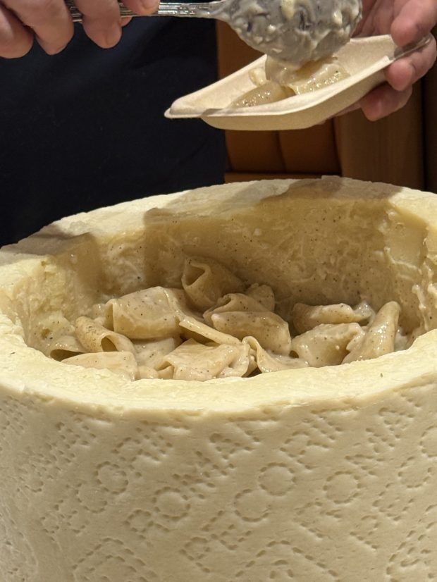 Cacio e Pepe, made in a Pecorina Romano Cheese Wheel with pepper, is just one of the plethora of menu items at Eataly, King of Prussia. (PEG DEGRASSA/ DAILY TIMES)