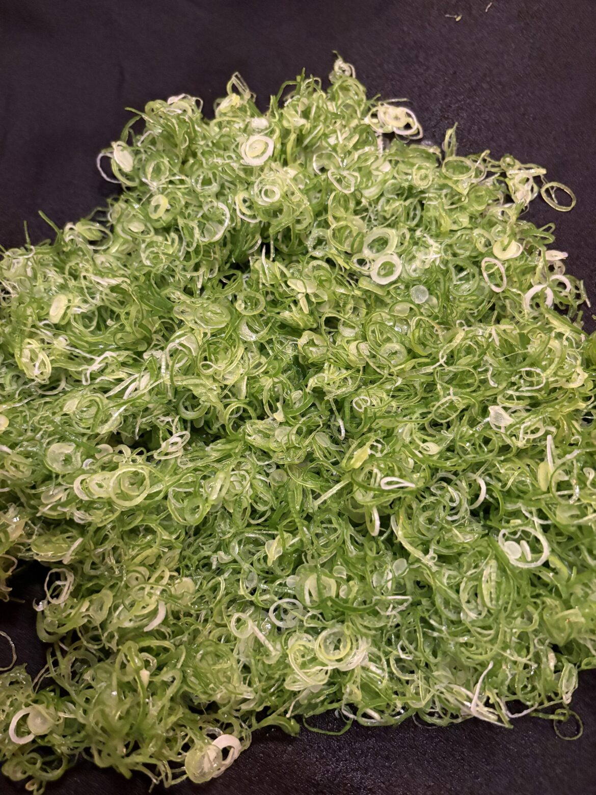 Cutting chives everyday except I work at a sushi bar and its not chives