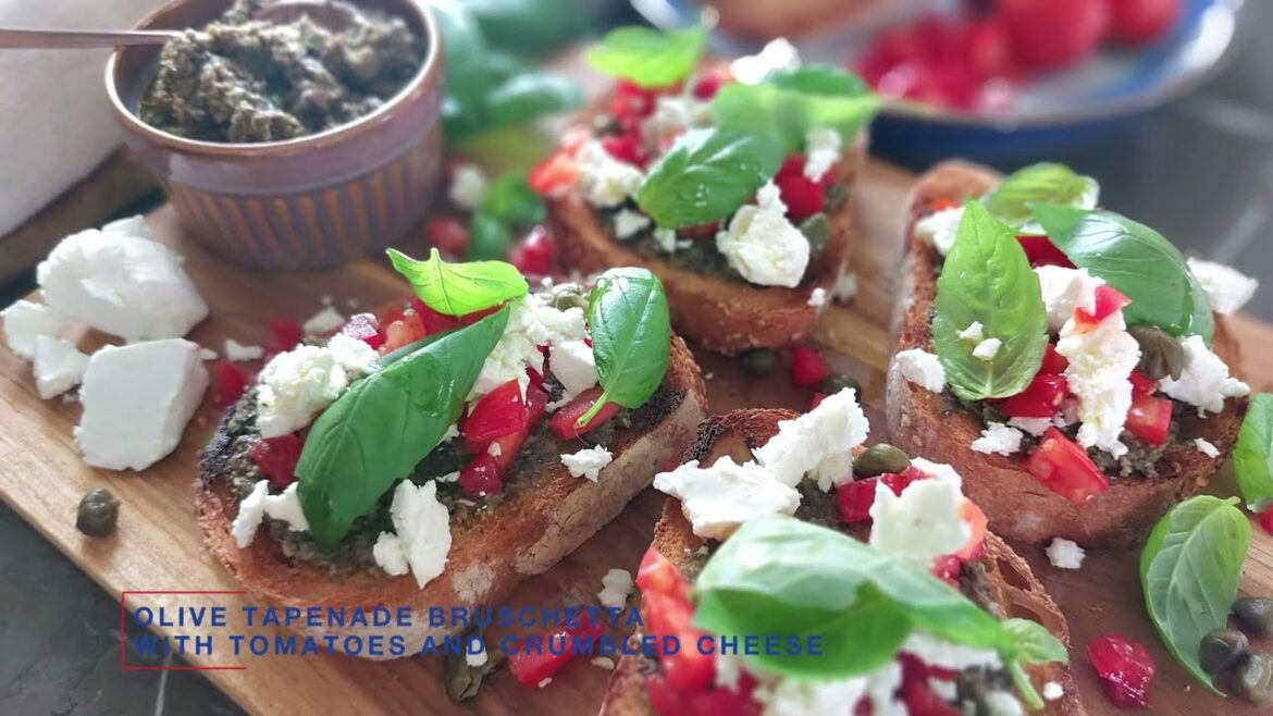 Olive tapenade bruschetta with tomato cheese and crumbled cheese