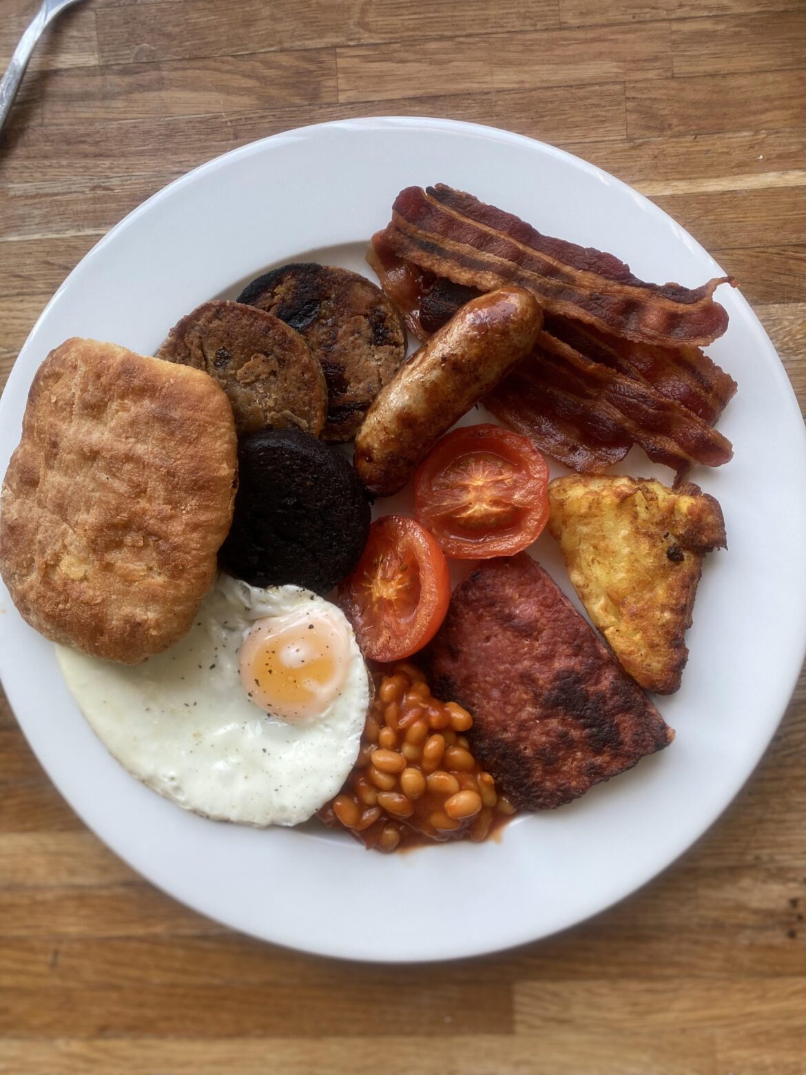 Scottish fry with some fruit pudding and a buttery