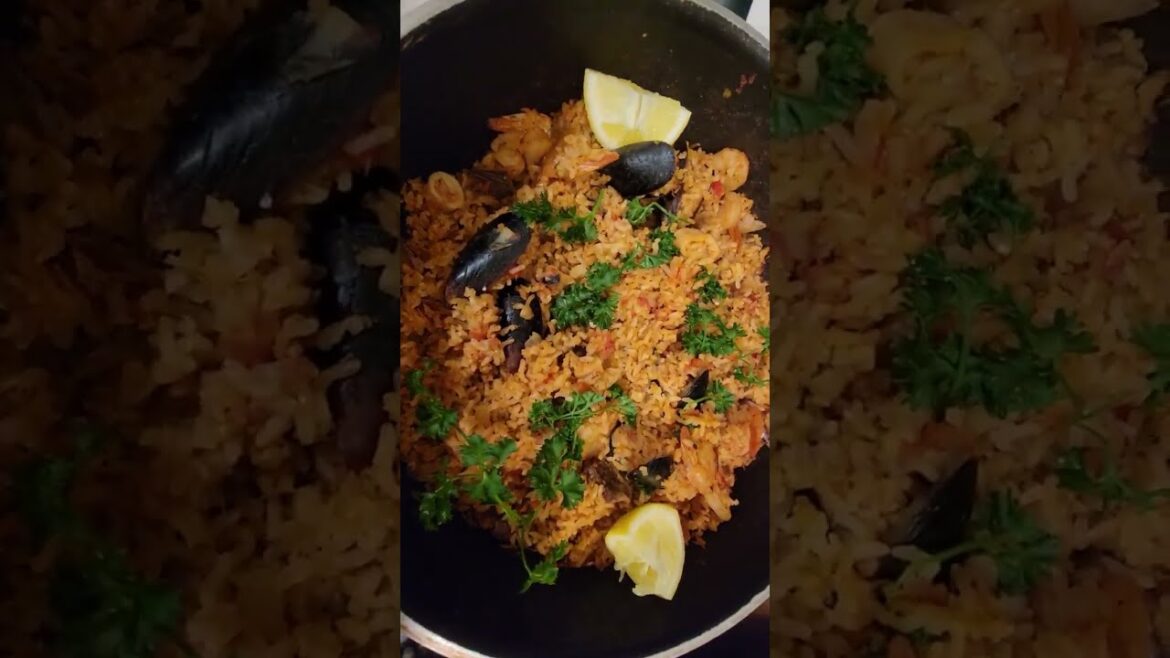 Authentic Spanish Seafood Paella Recipe with grilled clams! #paella #cooking #seafood #spainfood #re