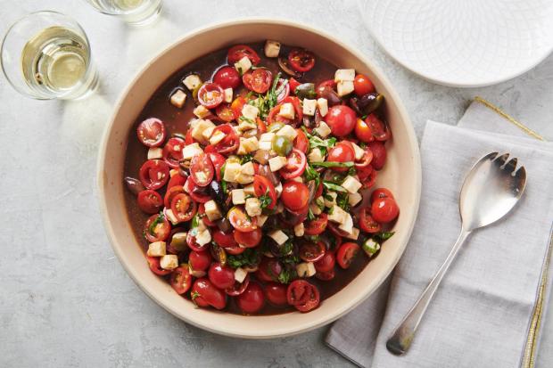 A recipe for cherry tomato and mozzarella salad is displayed in New York in June 2019. (Cheyenne M. Cohen via AP)