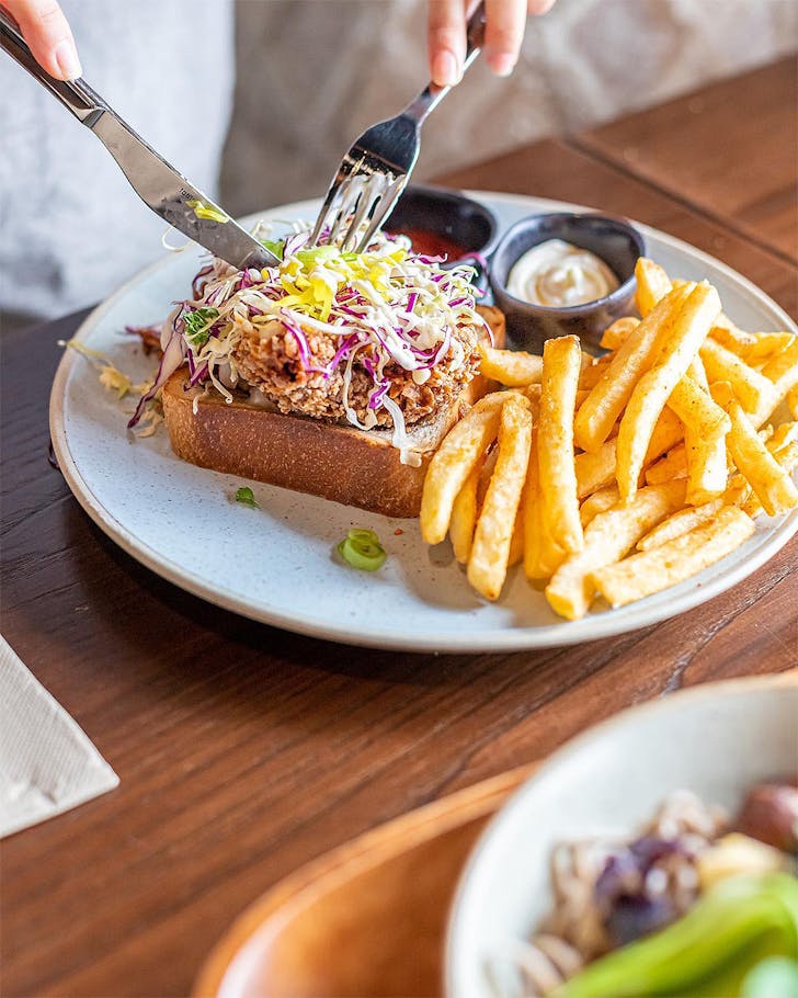 The chicken sando sandwich at Pikuniku, one of the best breakfasts in Auckland.