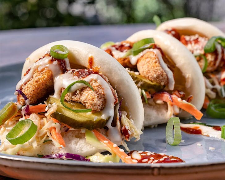 Crispy Tofu Bao Bun, with KINDs famous hot sauce! 