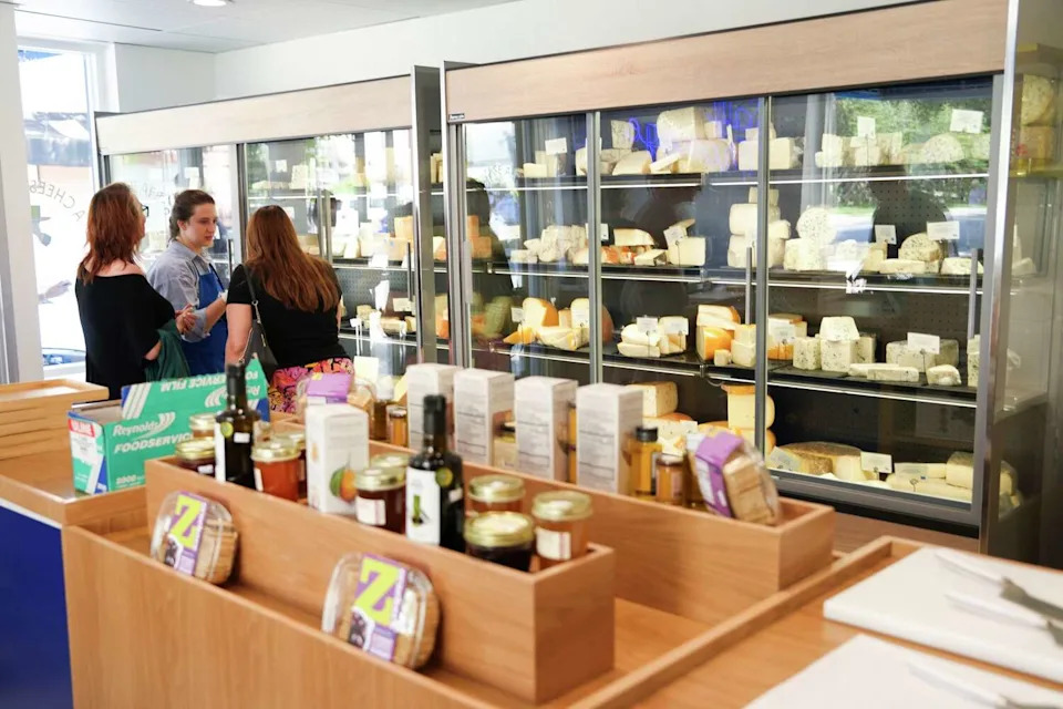 Customers are helped at A Cheese Affair in Rice Village in Houston, Friday, Sept. 26, 2025. (Jason Fochtman/Houston Chronicle)