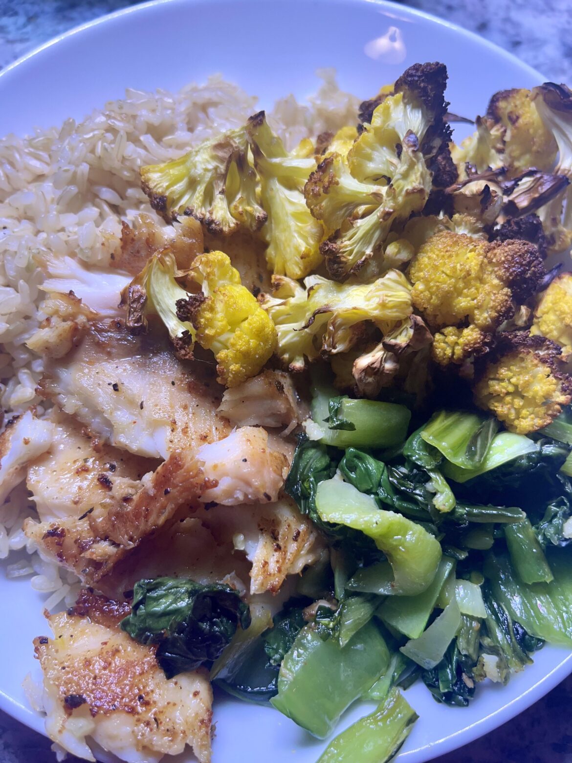 Brown rice, tilapia, cauliflower, and bok choy