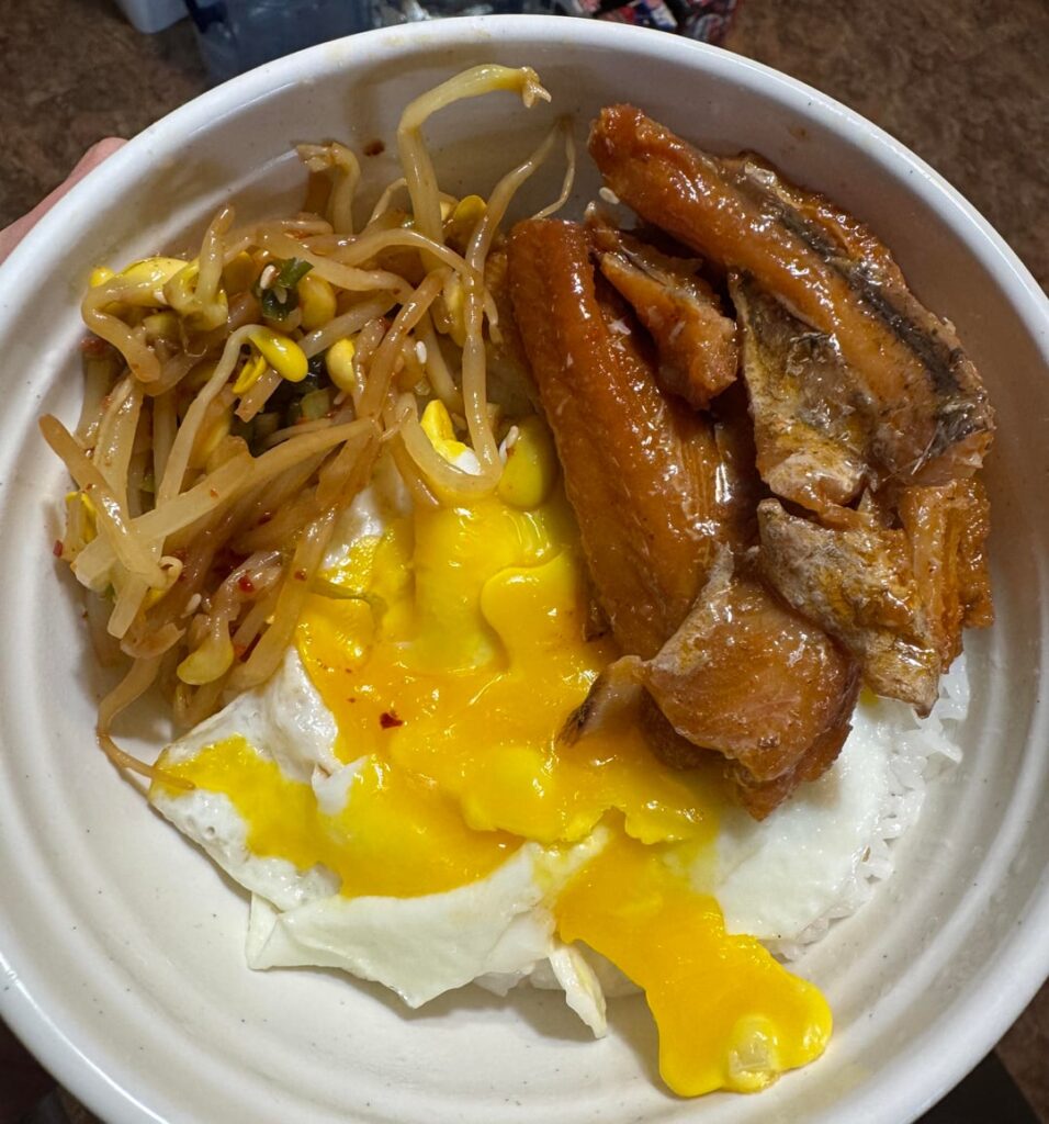 Roasted Chili Eel, Fried Egg, Soy Bean Sprout Salad over White Sticky Rice