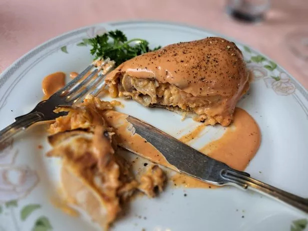Crab la Rochelle is a delight of minced crab and mushroom, with spicy brandy sauce