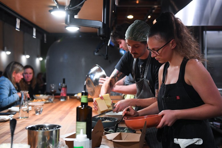 Haley McDaniel plates a dish at Osteria DOP in Eugene, October 9, 2025.