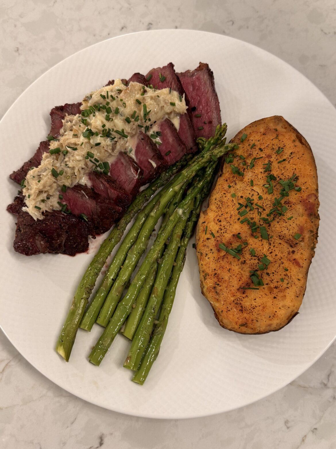 Domestic Wagyu Filet with Crab topper, twice baked potato, and asparagus!
