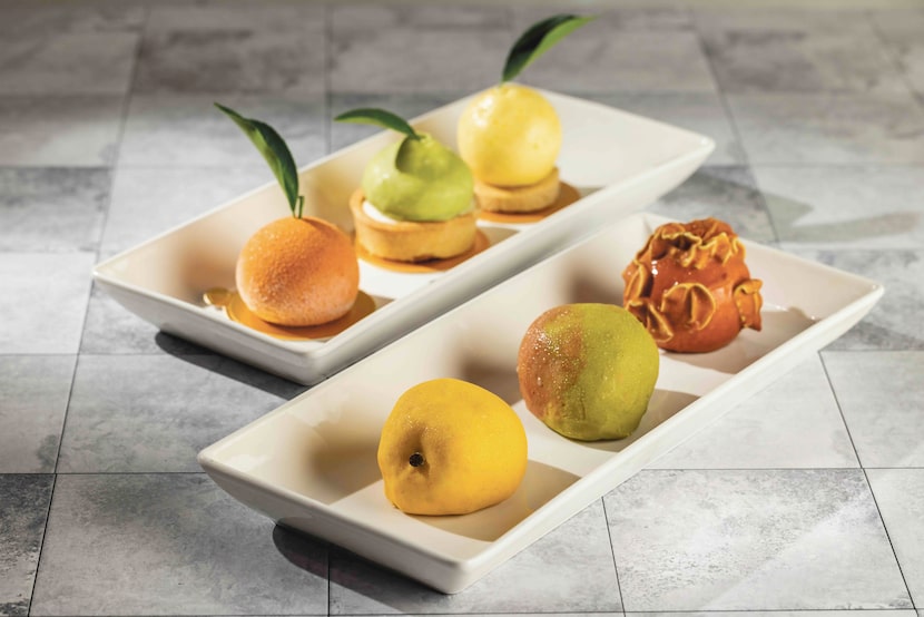These stunners are some of Andy Pham’s hyperrealistic fruit pastries. The lemon one is...