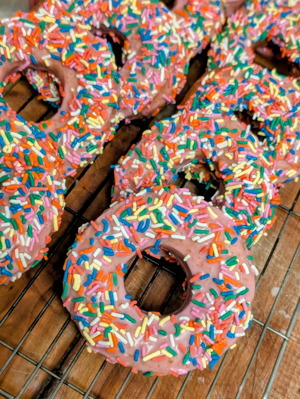 [homemade] Pink Iced Donuts With Sprinkles