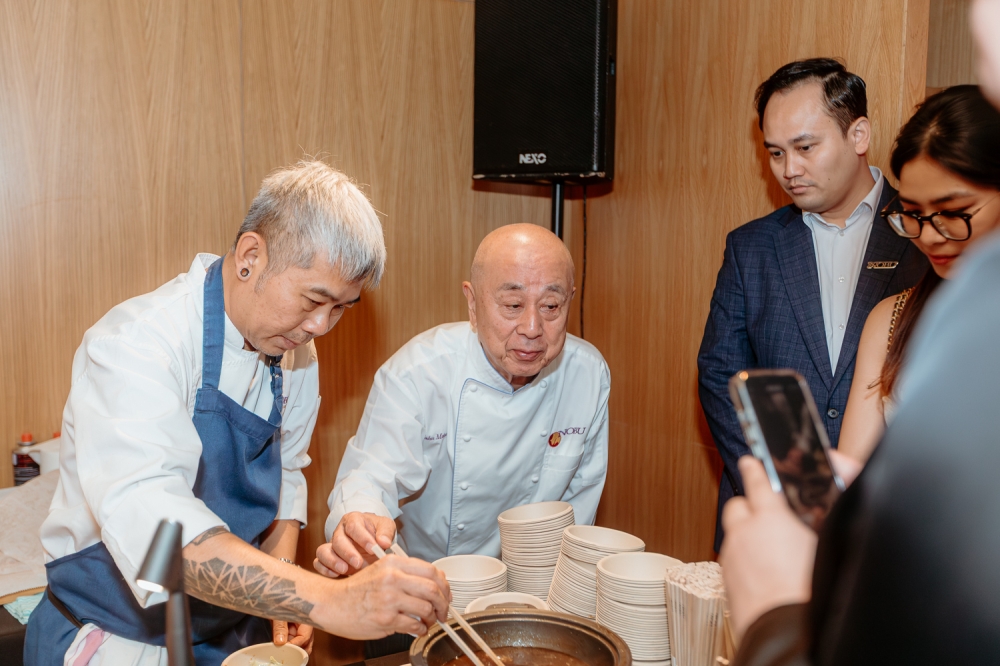 Nobu Matsuhisa (centre) prepares dishes with his team during Nobu Kuala Lumpur’s 10th anniversary celebration. — Picture by Raymond Manuel
