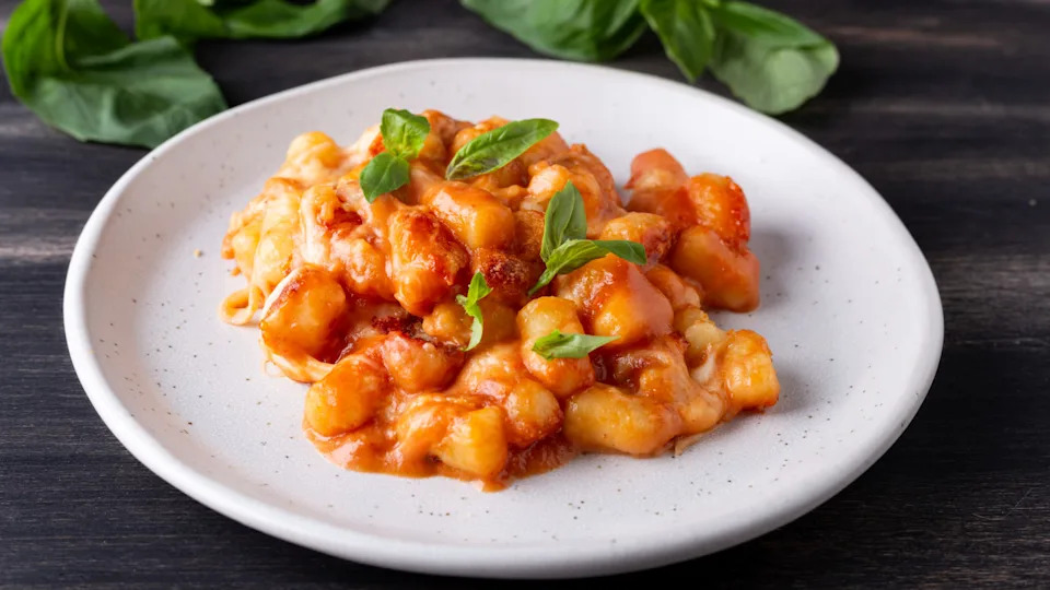 Gnocchi with tomato sauce, mozzarella cheese, and basil.Photo by Noemi Toscano via Getty Images
