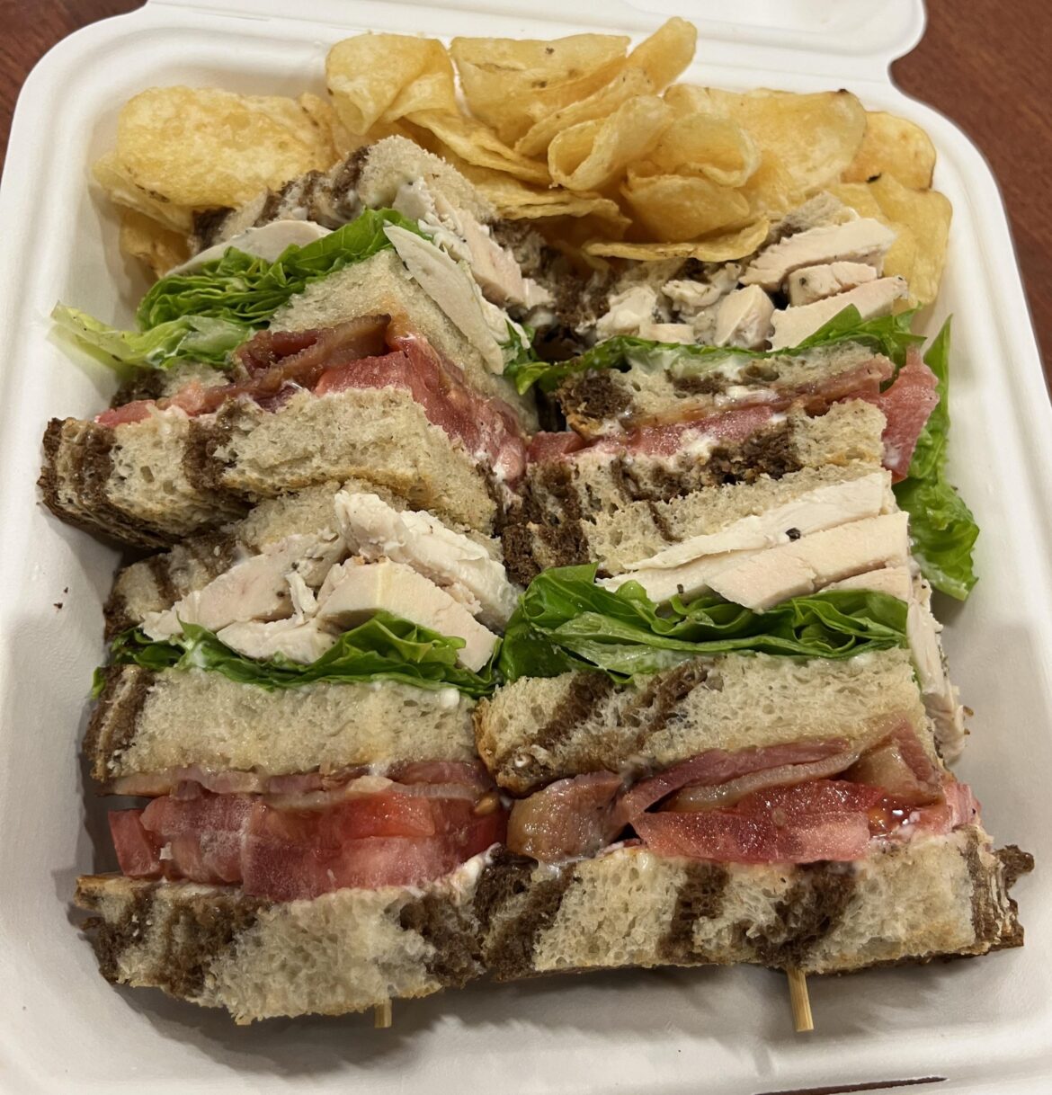 Chicken bacon club on marble rye with kettle chips