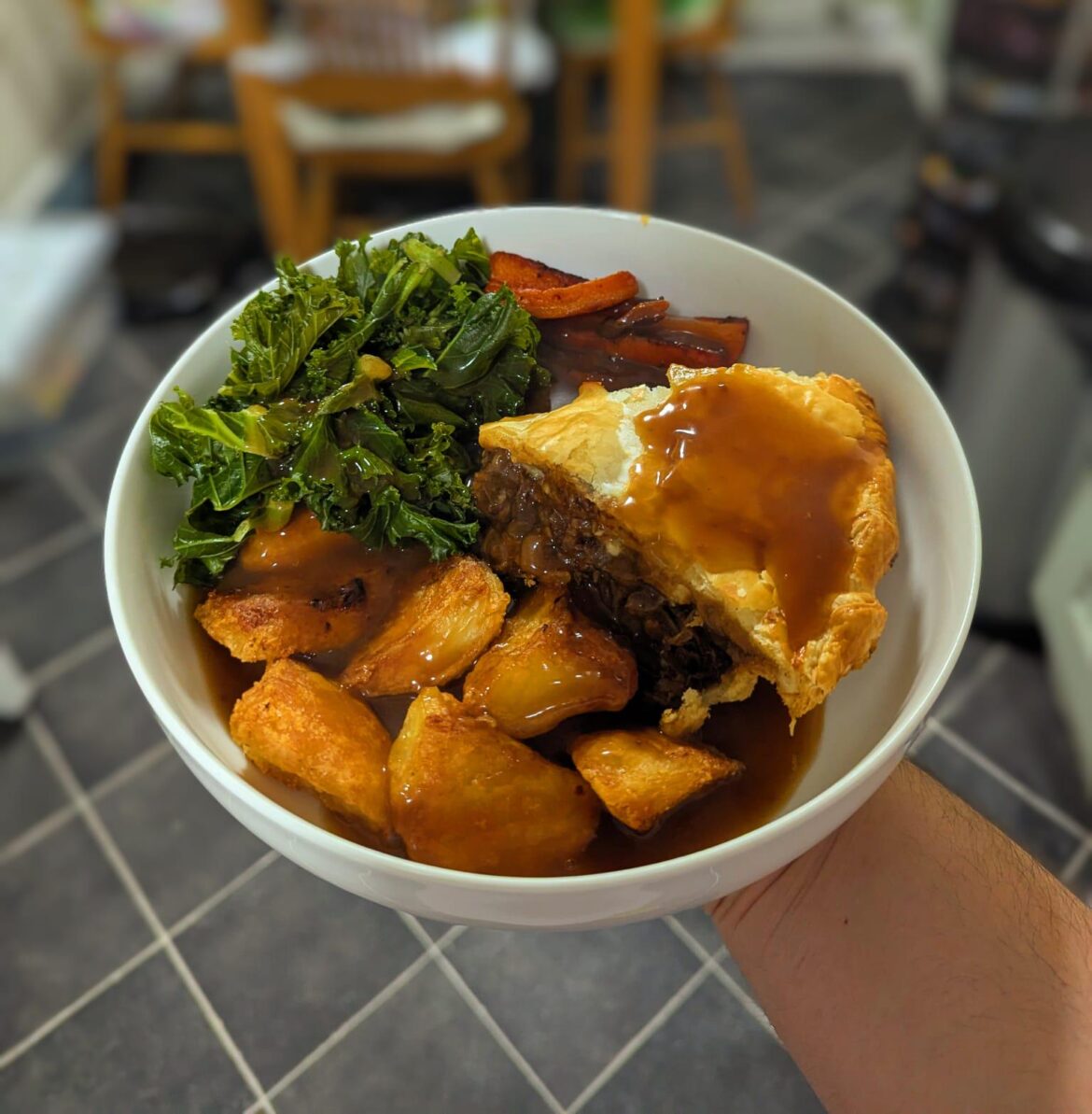 Steak and cheese pie, with roast potatoes and honey roast carrots with kale. Made by my incredibly talented girlfriend🙂