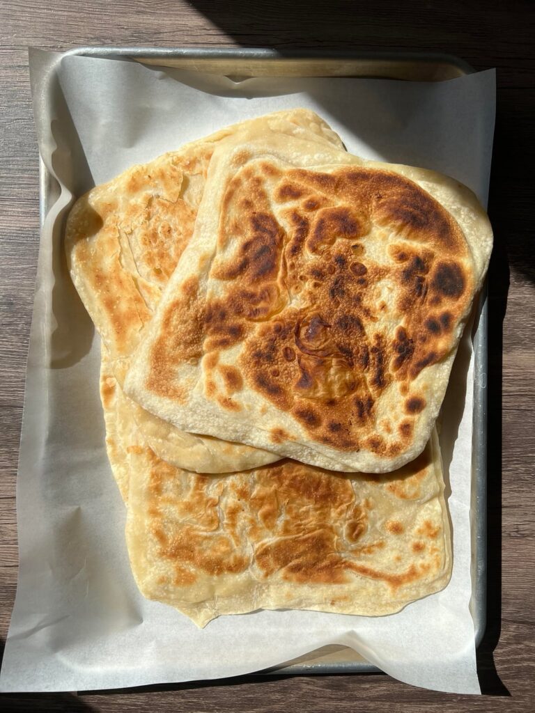 Made Yemeni Khobz Tawa, a soft, flaky layered flatbread cooked on a skillet