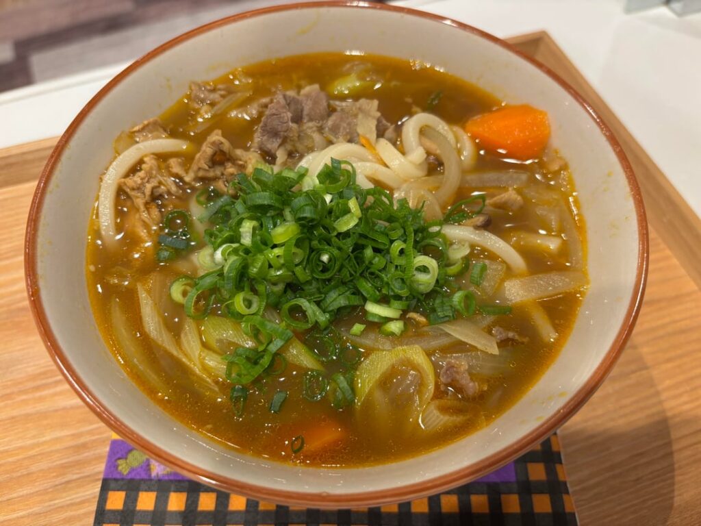 Beef and pork curry udon go Blue Jays holy shit they grand slammed it up to nine