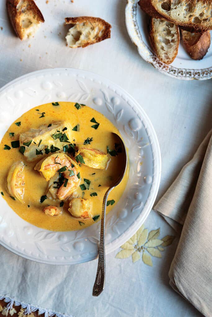 Bowl of fish stew with aioli