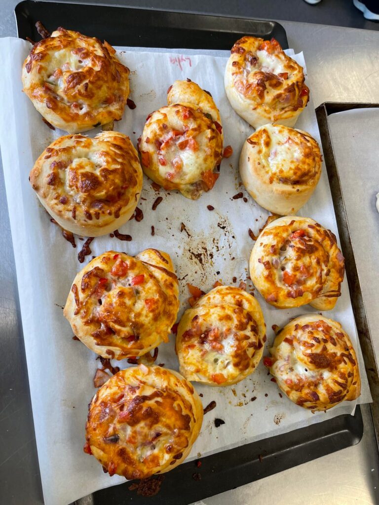 First day in baking and pastry school, made pizza pinwheels and little bread rolls!